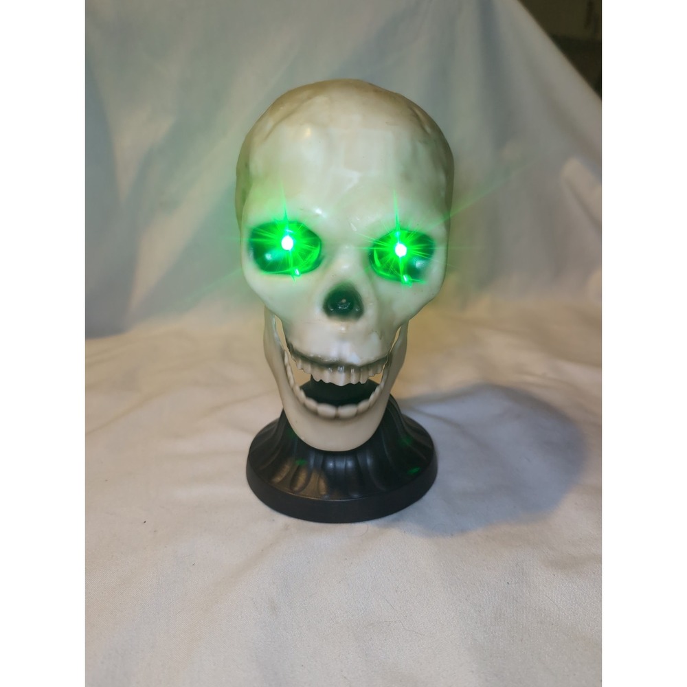 Giggles Int. Halloween Animatronic Talking Skull Green Light Up Moving Jaw 9"